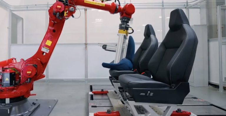 Tesla reveals Cybertruck seats in butt robot video | Electrek